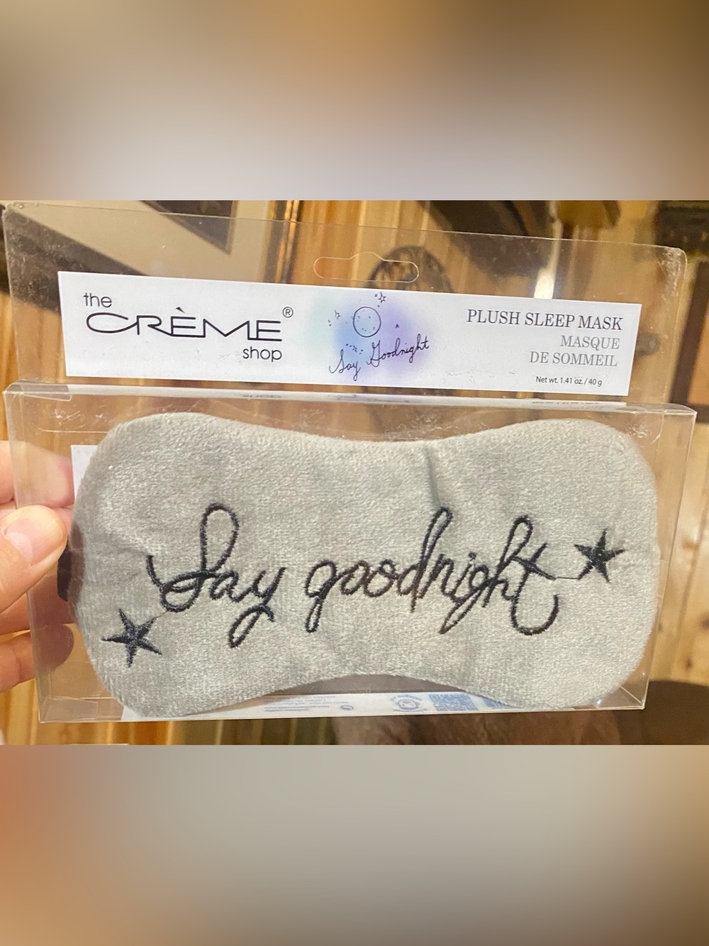 The Crème Shop gray plush sleep mask embroidered "Say Goodnight”